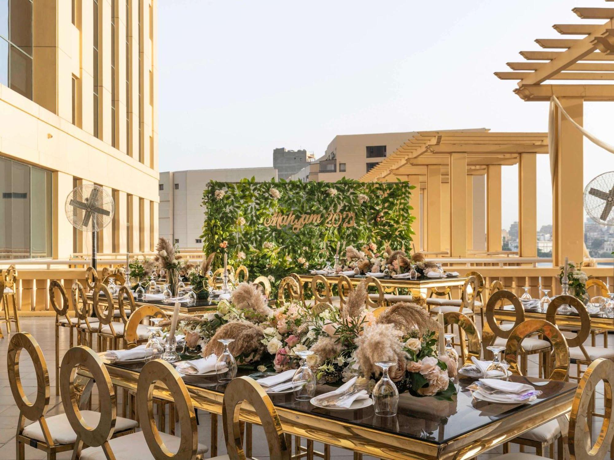 Fairmont Nile City Cairo Exterior photo The Terrace at The St. Regis Mumbai
